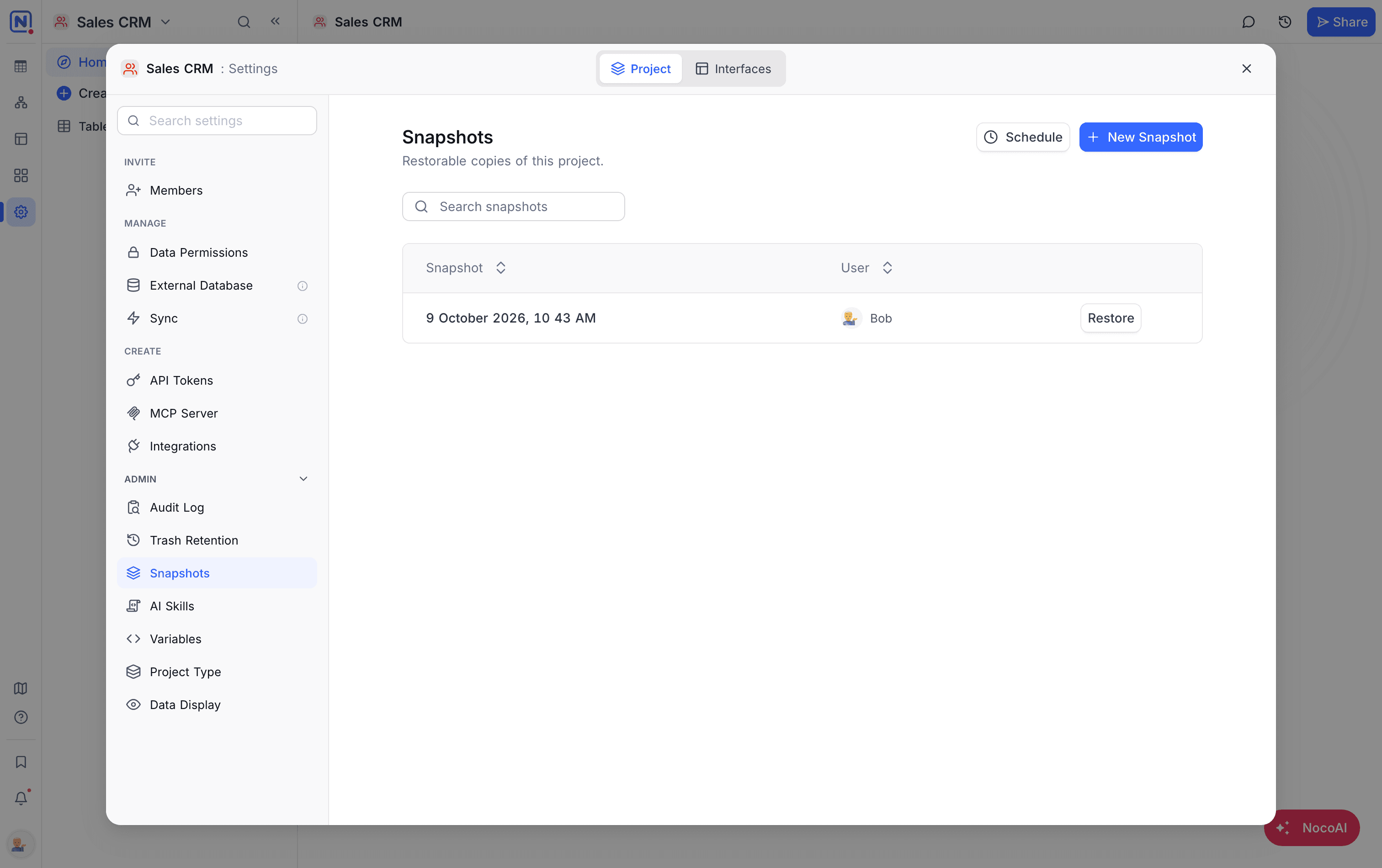 A snapshot listed with its Restore button and actions menu